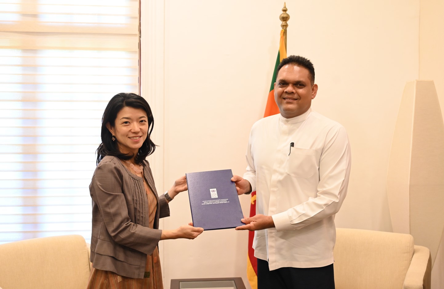 Ms. Azusa Kubota, Resident Representative, UNDP in Sri Lanka hands over SDGs Taxation Framework (STF) Diagnostic Evaluation Mission Report to Hon. Shehan Semasinghe, State Minister of Finance